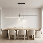 Linear LED Pendant Light – hung above a dining table with chairs