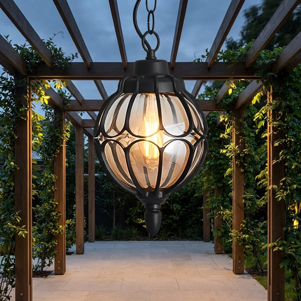 Outdoor Glass Globe Pendant Light – hanging under a pergola on a garden path