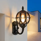 Bird's Nest Outdoor Wall Lantern – mounted on a stucco wall at dusk