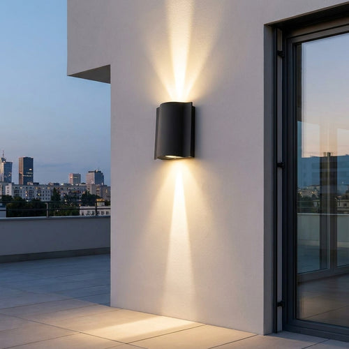 Black Up & Down Outdoor Wall Light – up and down beams on a terrace wall