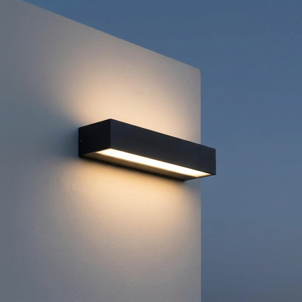 Slim Outdoor LED Wall Washer Light – close-up lit on a plain wall at dusk