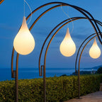 Water Drop Outdoor Pendant Light – three pendants hanging from wooden garden arches