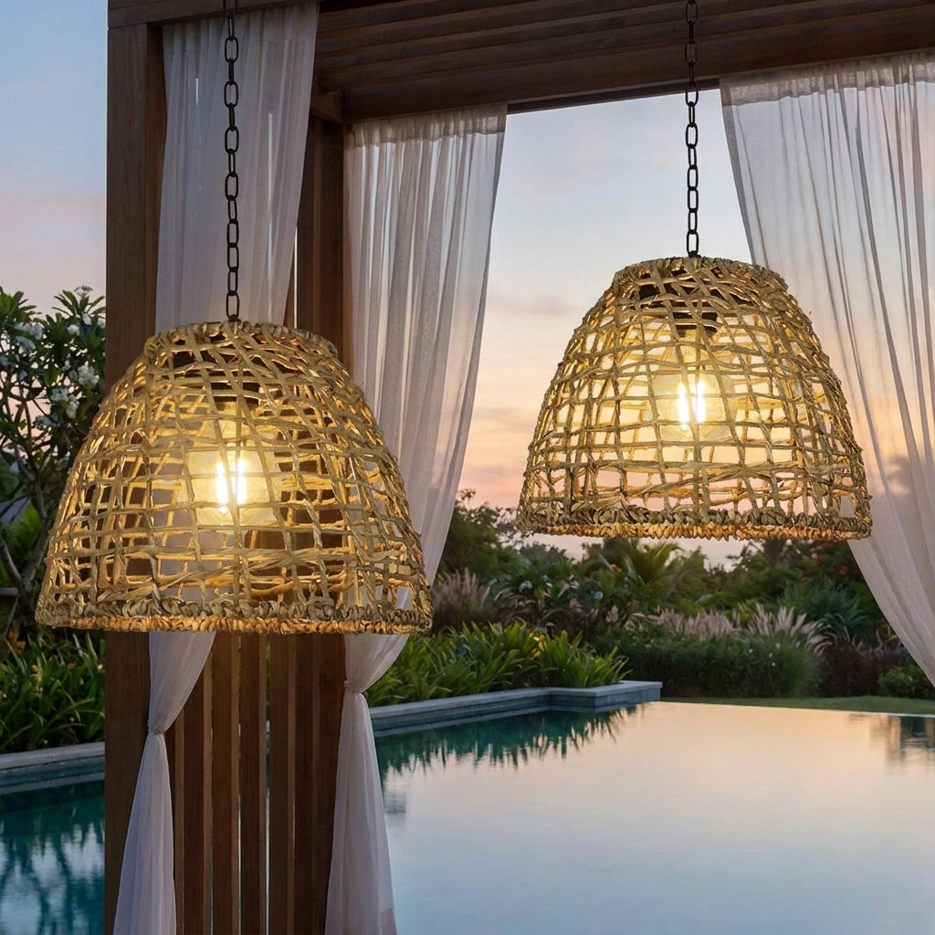 Solar Bell Outdoor Pendant Lantern – lit hanging over a pool at dusk