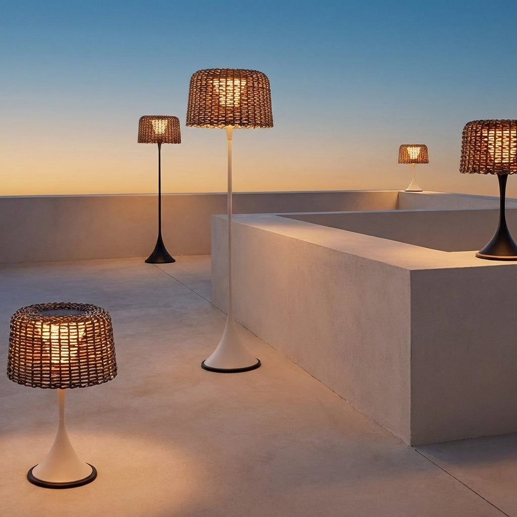 Woven Solar Outdoor Floor Lamp – lit on a rooftop terrace at dusk