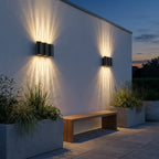 Black Up & Down Outdoor Wall Light – pair up and down lit above a bench
