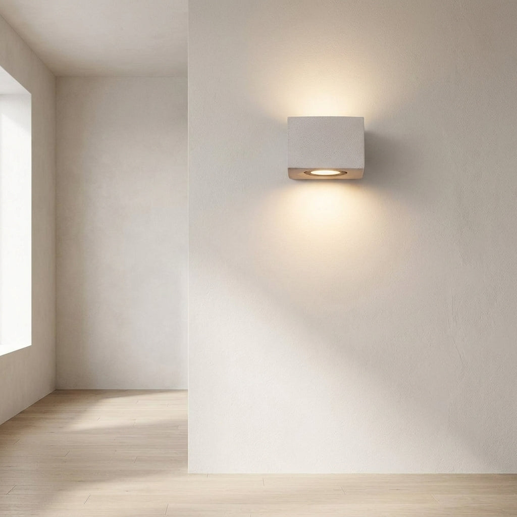 Concrete Outdoor LED Wall Light – mounted on a hallway wall beside a window