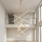 White Linear LED Chandelier – lit fixture above a mezzanine landing