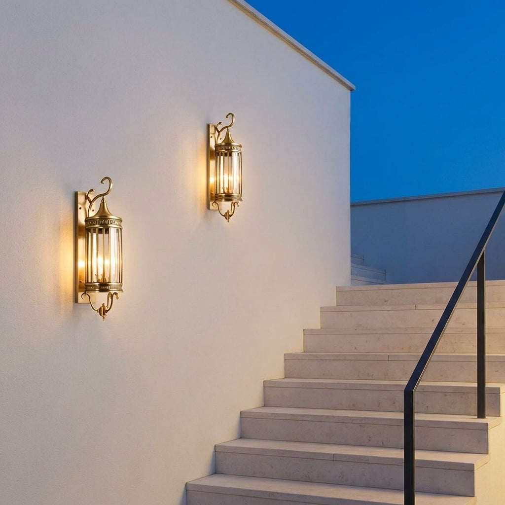 Mid Century Copper Outdoor Wall Lantern – two lanterns lit beside outdoor stairs at dusk