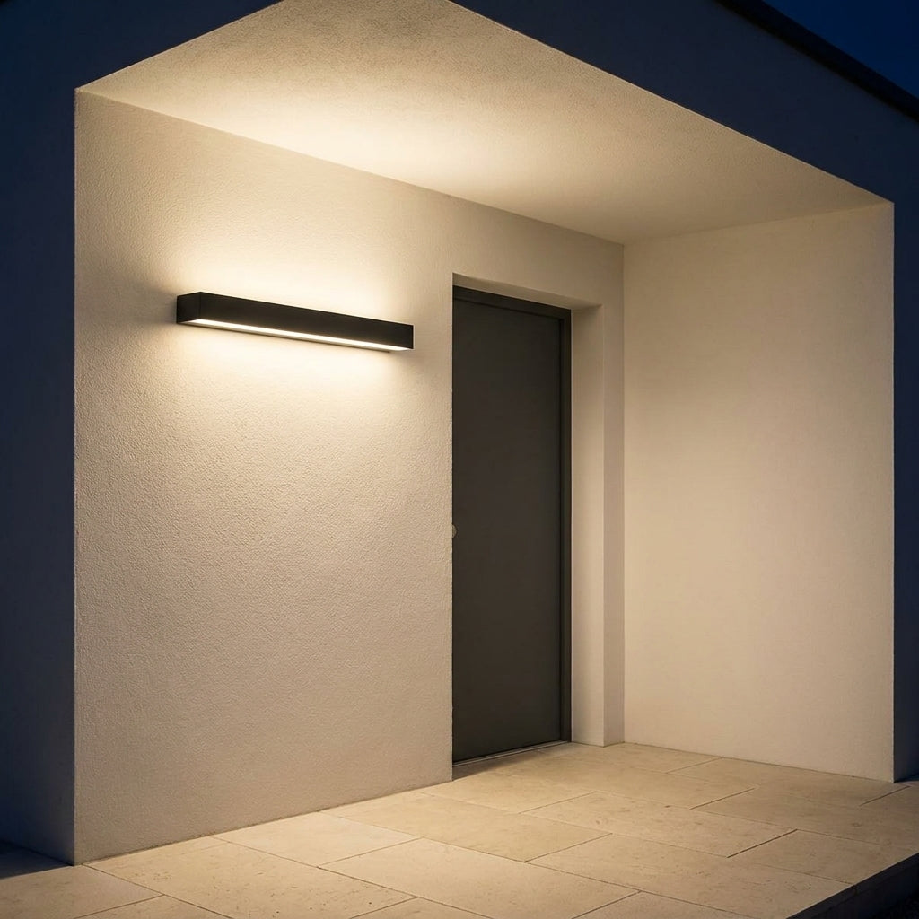 Slim Outdoor LED Wall Washer Light – mounted beside a doorway in a covered porch