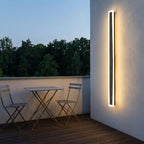 Solar LED Strip Porch Wall Light – lit above a balcony bistro table at dusk