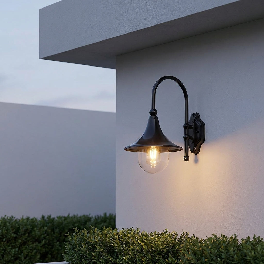 Farmhouse Horn Outdoor Wall Light – on a gable wall above shrubs at dusk