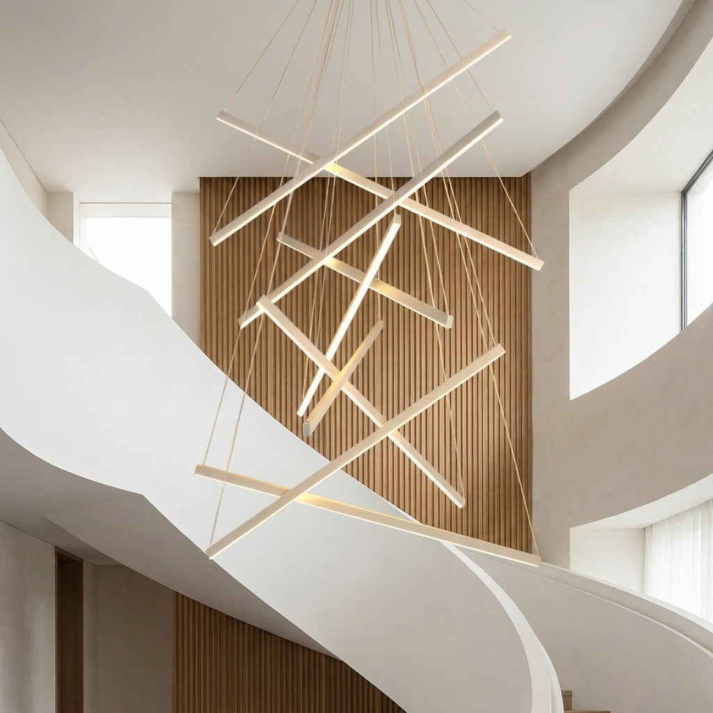 White Linear LED Chandelier – lit fixture against a wood-slatted feature wall