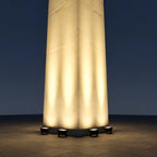 IP65 Outdoor LED Waterfall Wall Light – ground-mounted uplights at the base of a column