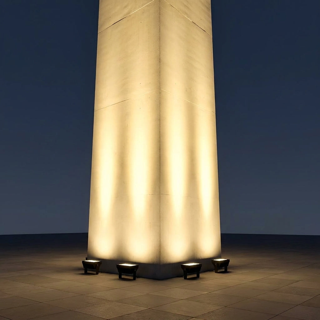IP65 Outdoor LED Waterfall Wall Light – ground-mounted uplights at the base of a column