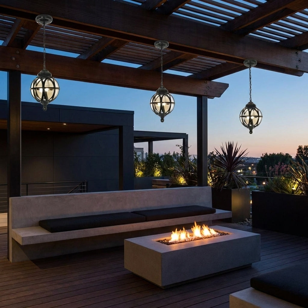 Outdoor Glass Ball Chandelier – hanging from a pergola at dusk