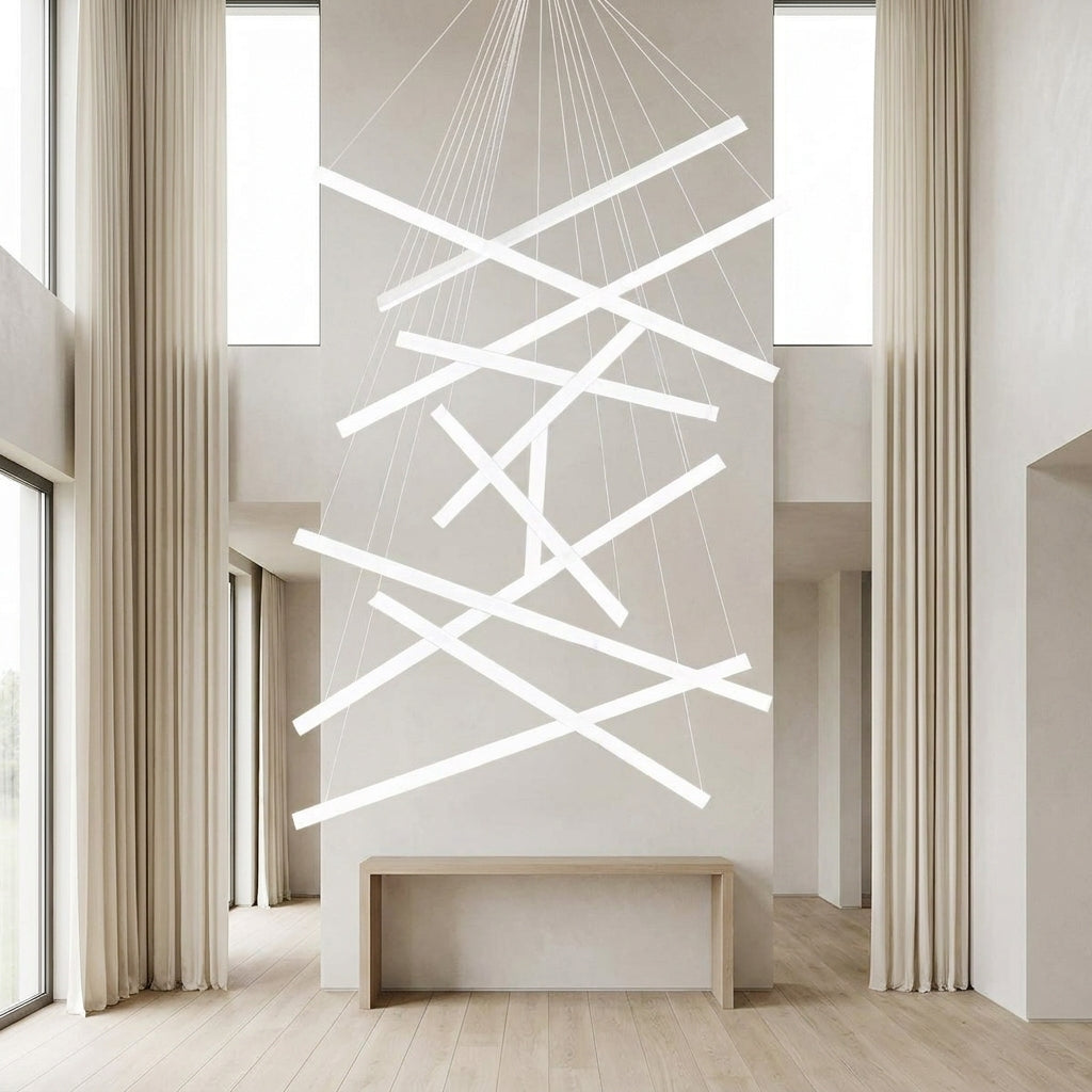 White Linear LED Chandelier – lit fixture between tall curtained windows