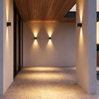 Square Outdoor Up & Down Wall Light – three lights mounted under a wooden ceiling