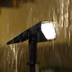 Adjustable Solar Garden Spotlight – waterproof spray test in low light