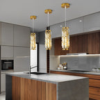 Crystal Glass Pendant Chandelier – three gold-finish pendants above a walnut kitchen island