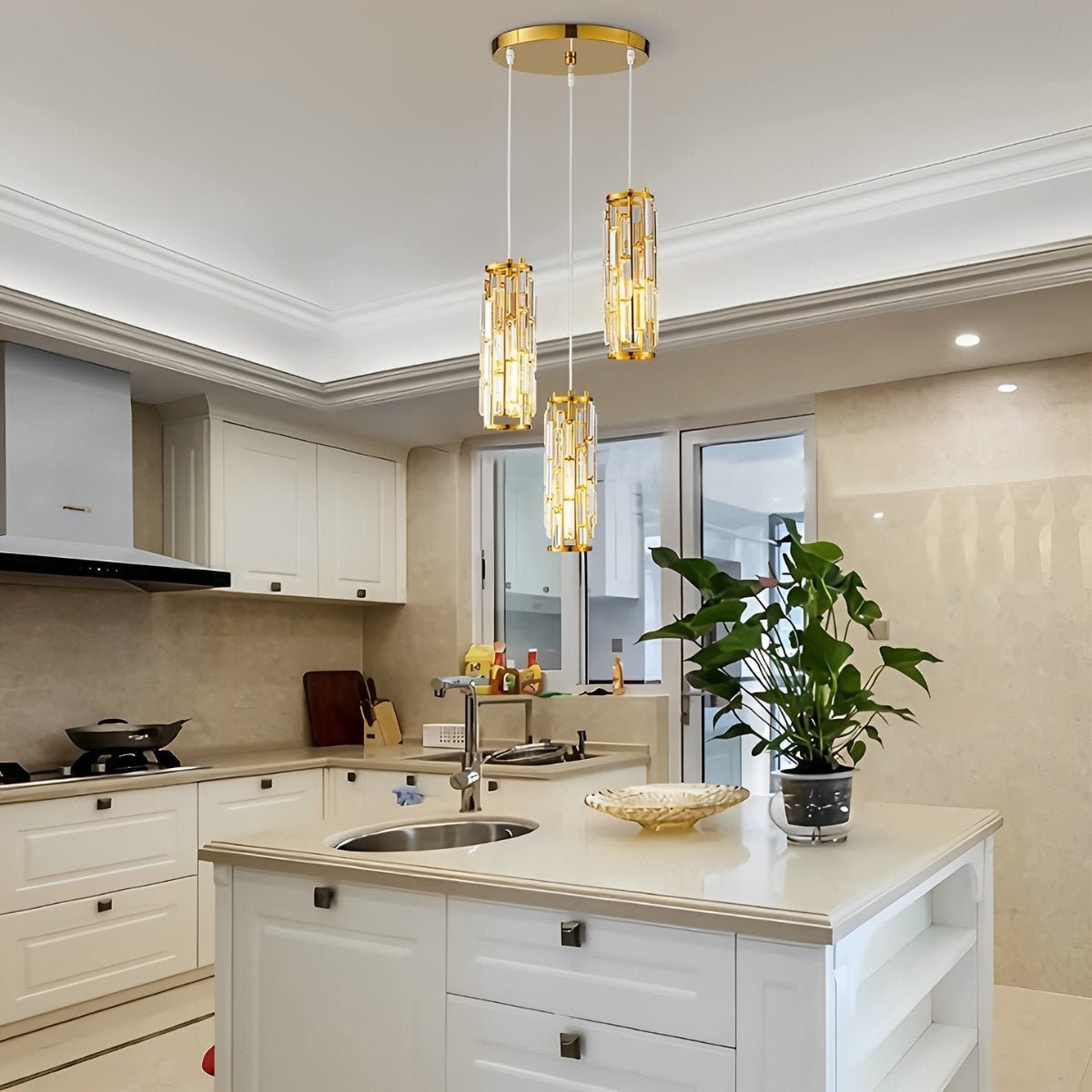 Crystal Glass Pendant Chandelier – three gold-finish pendants above a white kitchen island