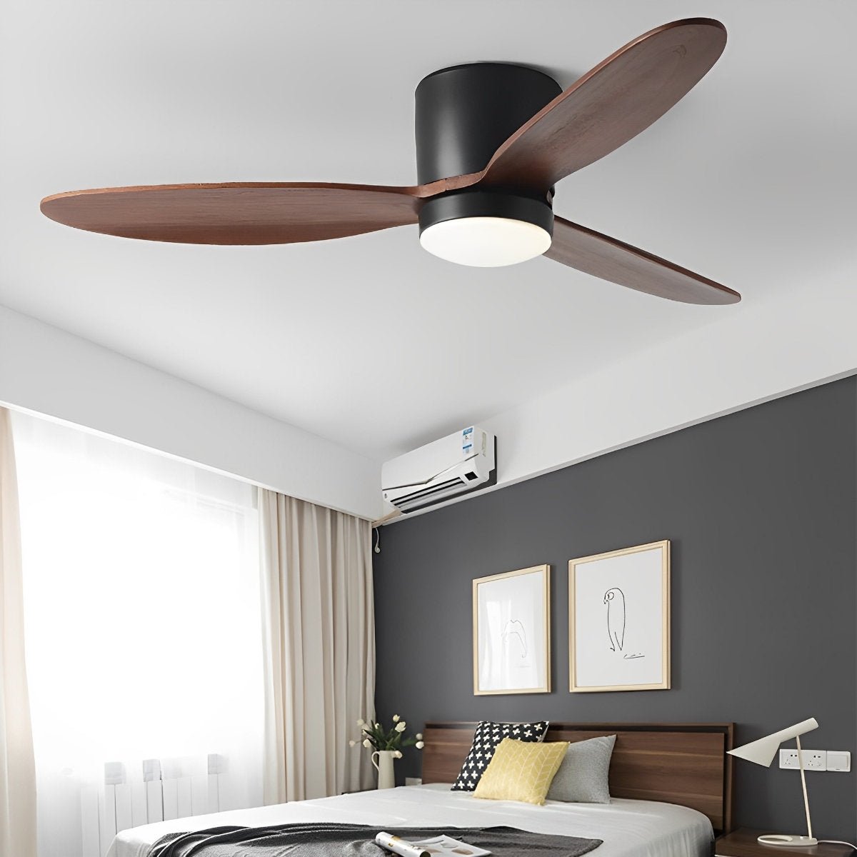 Low Profile DC Ceiling Fan with LED Light – matte black finish with walnut blades in a bedroom