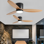 Low Profile DC Ceiling Fan with LED Light – two fans in black with light wood blades above a dining table