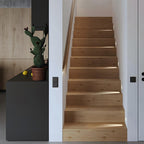 Recessed Motion Sensor LED Wall Light – unlit fitting beside a wooden staircase