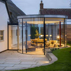 Slim Dimmable LED Linear Ceiling Light – lit around a curved conservatory ceiling at dusk