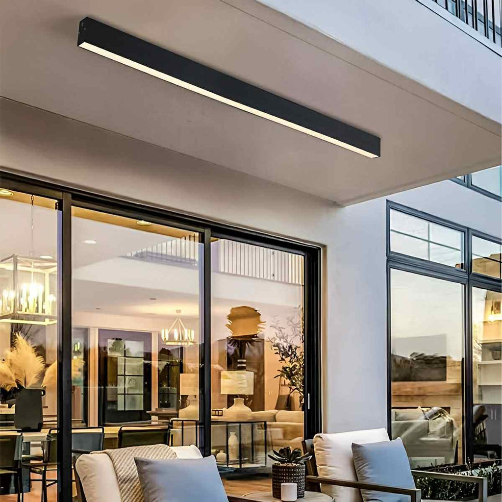 Slim Dimmable LED Linear Ceiling Light – lit under a patio overhang at dusk