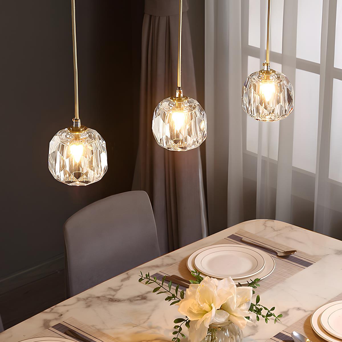 Brass & Crystal Dimmable Pendant Light – trio of round crystal pendants above a table