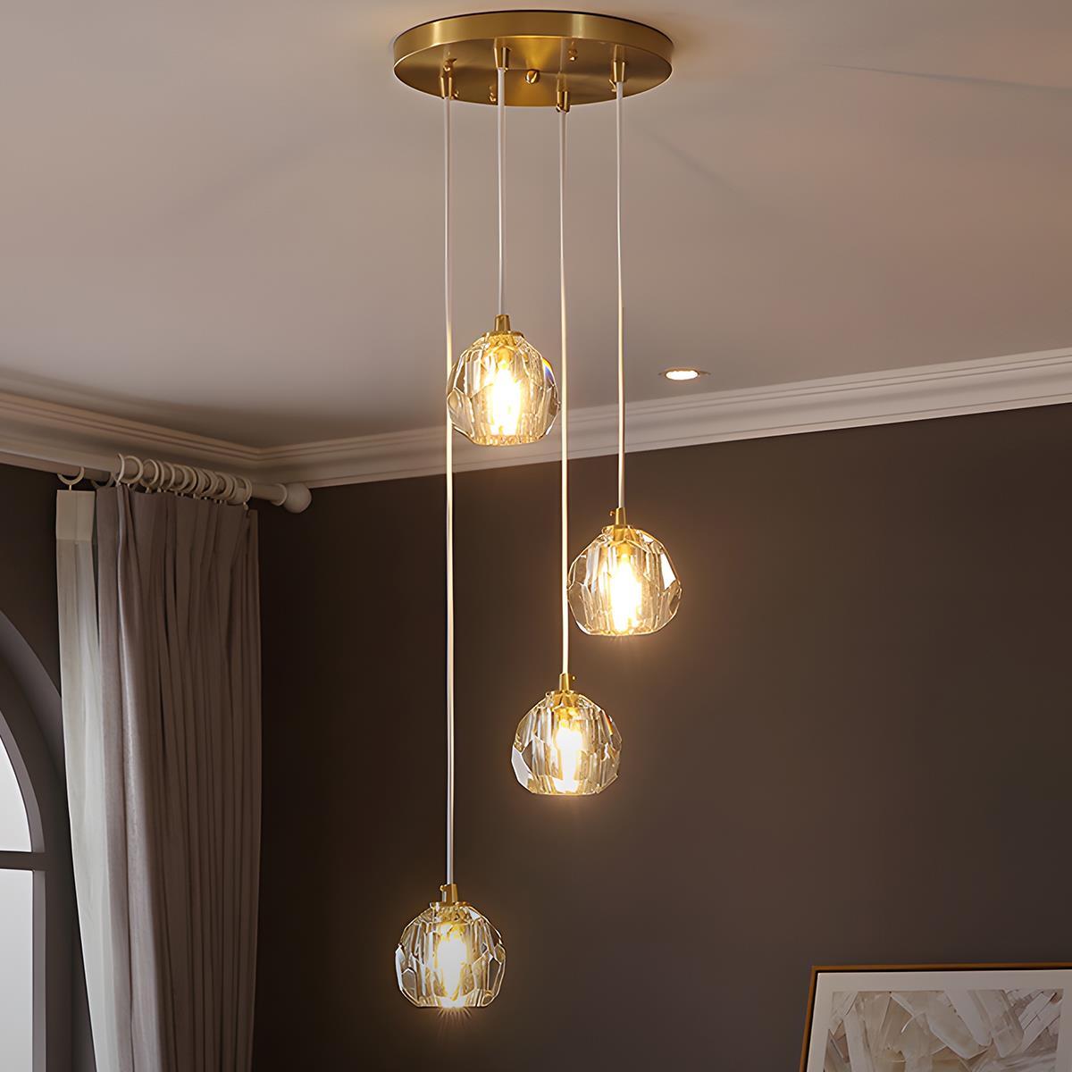 Brass & Crystal Dimmable Pendant Light – four round crystal pendants in a dining corner