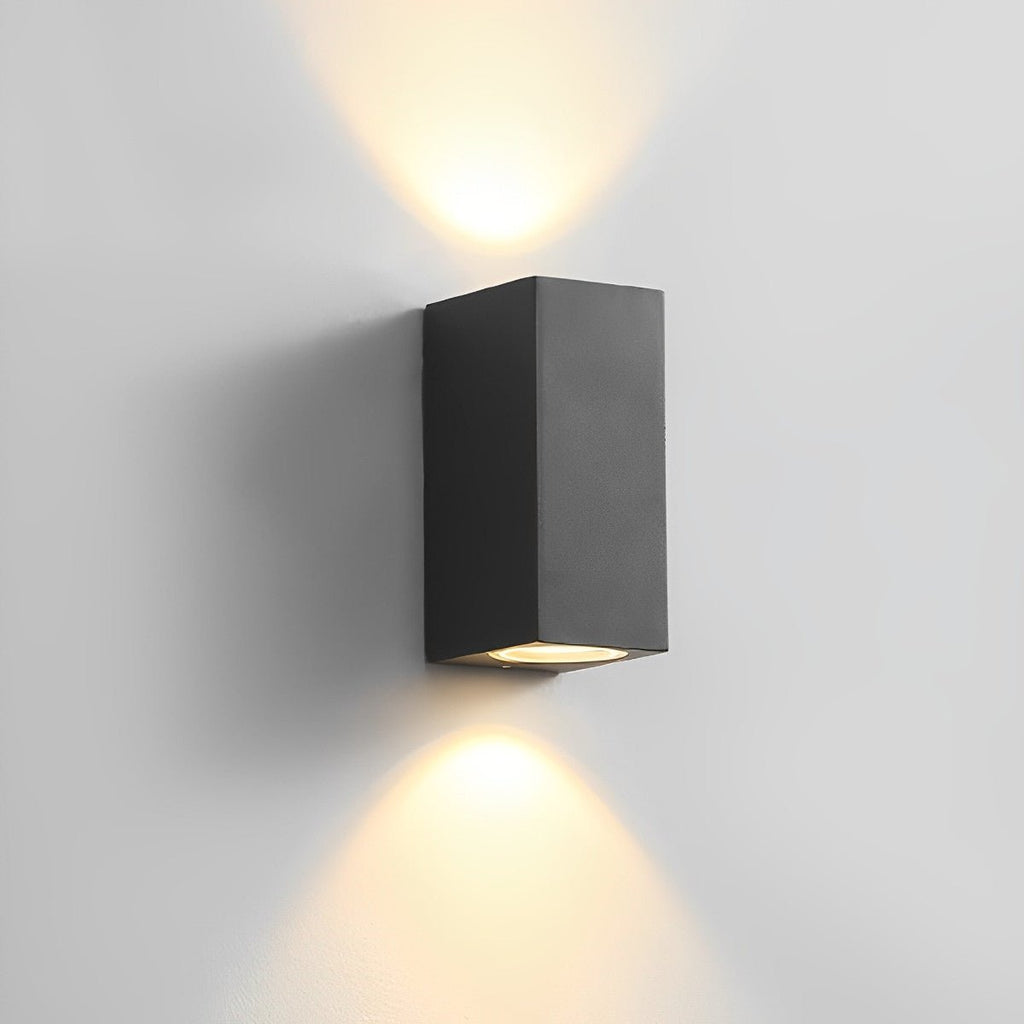 Square Outdoor Up & Down Wall Light – lit on a plain grey background