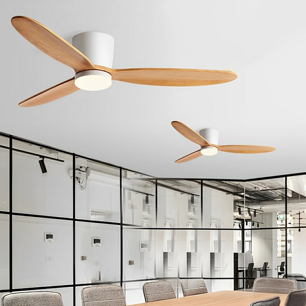Scandinavian Wood Finish Ceiling Fan with Light – mounted in a modern glass-walled office