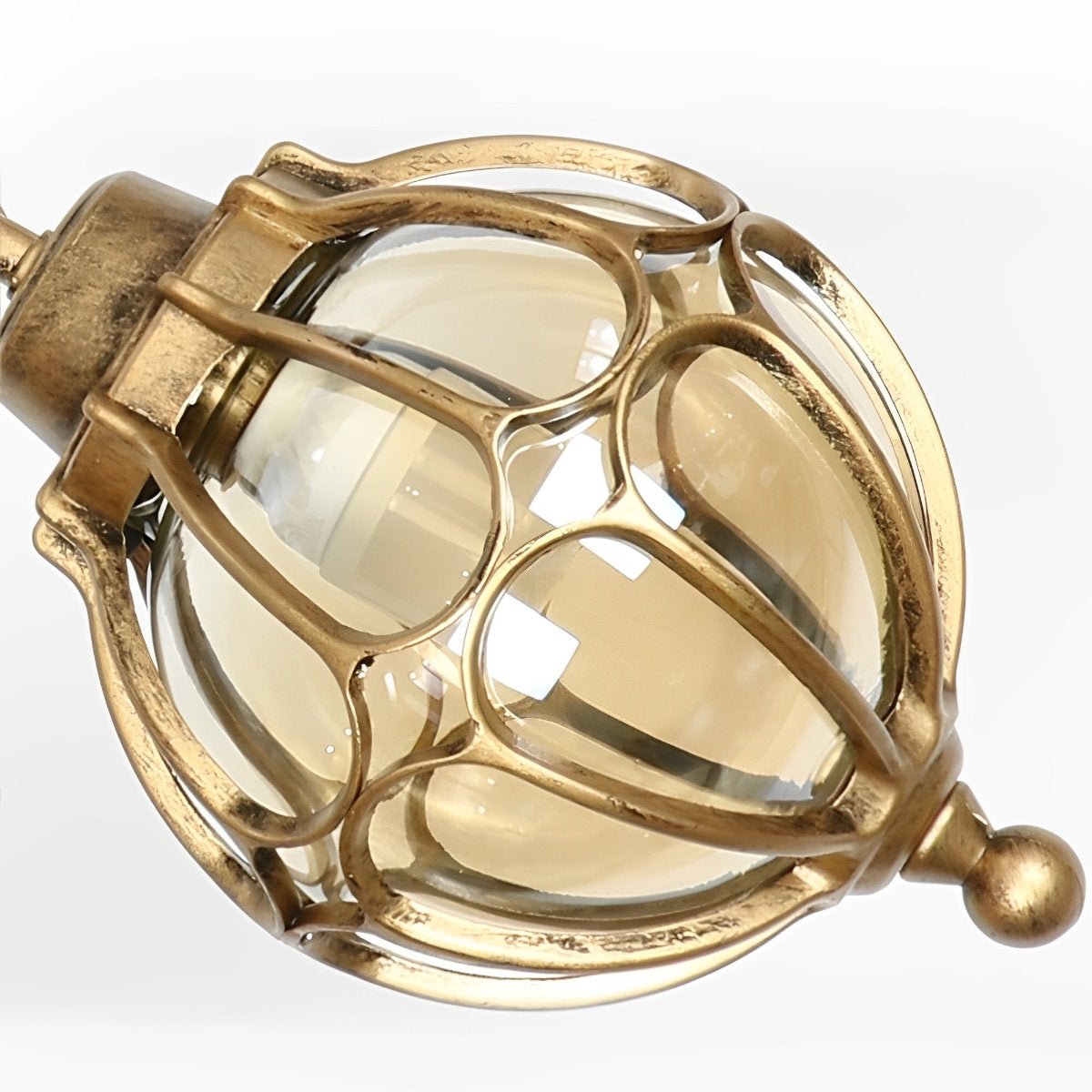 Outdoor Glass Globe Pendant Light – close-up of the brass finish, white background