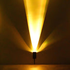 Solar Zoom Garden Spotlight – dramatic light beam pattern against a dark wall