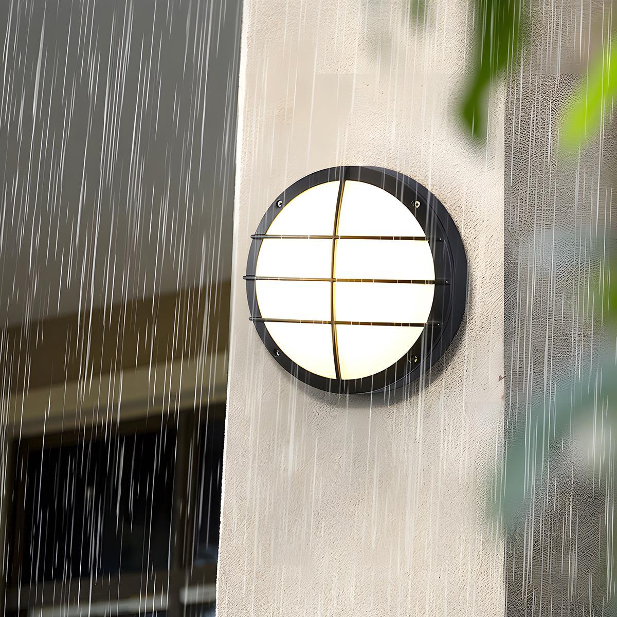 Round Outdoor LED Porch Wall Light – close-up in the rain, grid cover