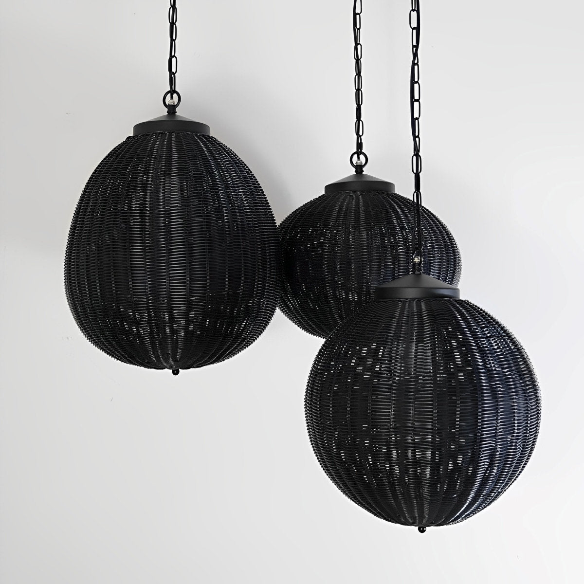 Black Rattan Outdoor Pendant Lantern – three shapes shown together, black finish