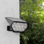 Solar LED Landscape Spotlight – mounted on a wall in the rain