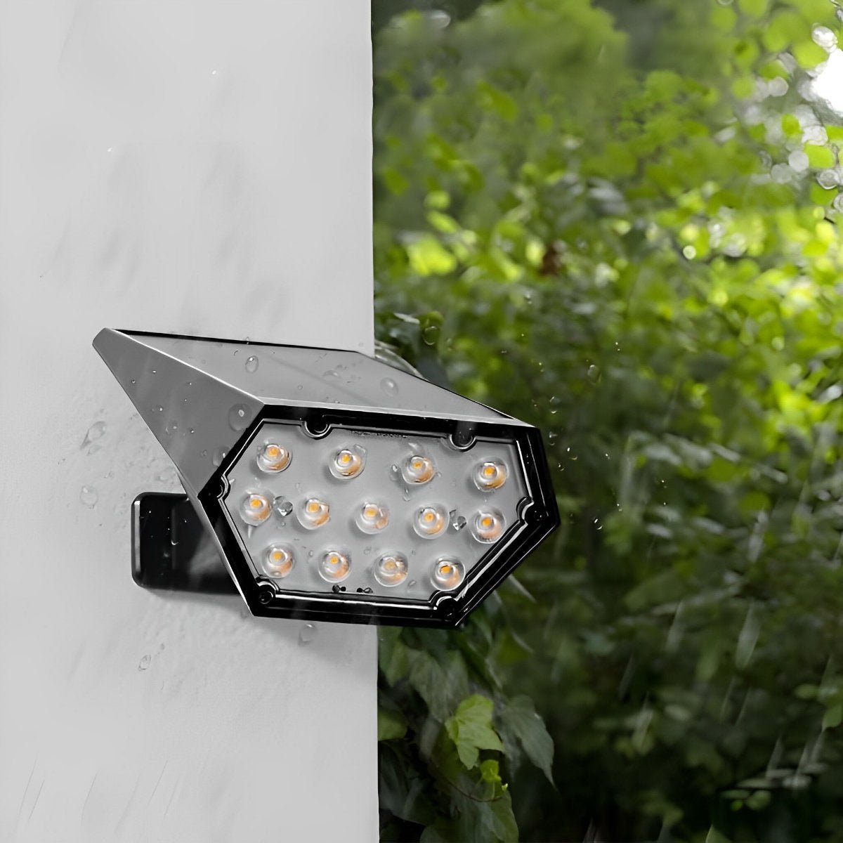 Solar LED Landscape Spotlight – mounted on a wall in the rain