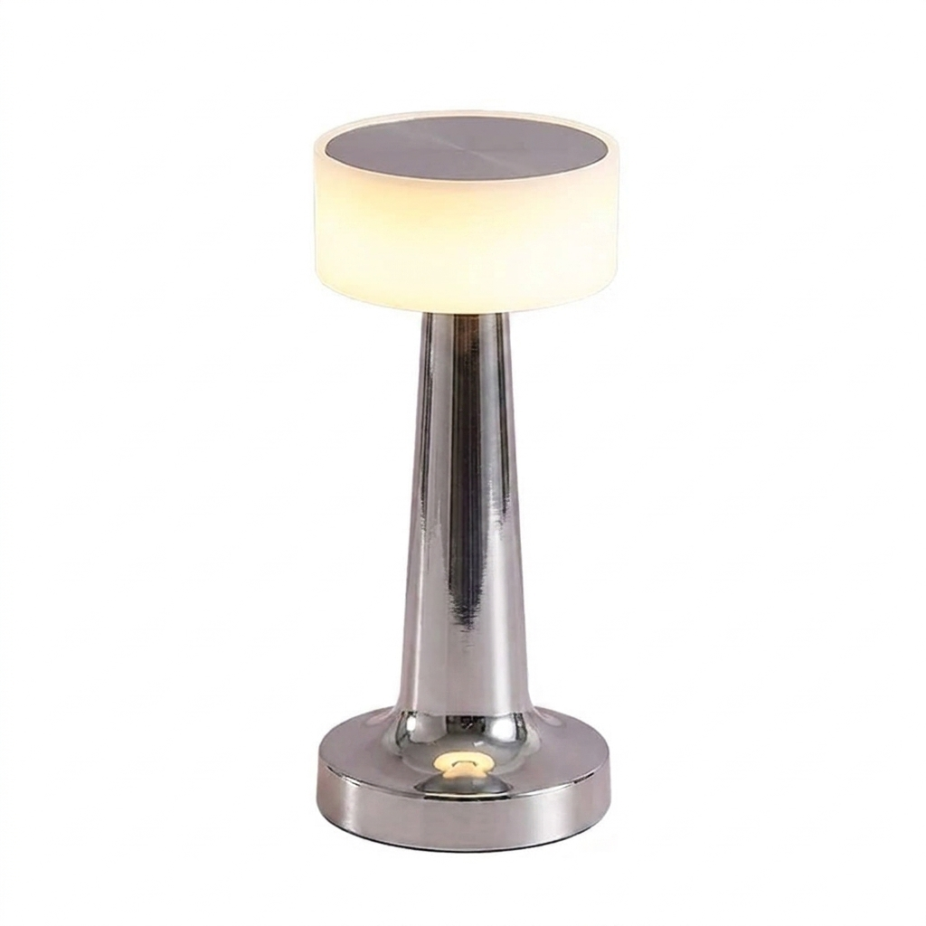 Pia Cordless Table Lamp – chrome finish lit, white background