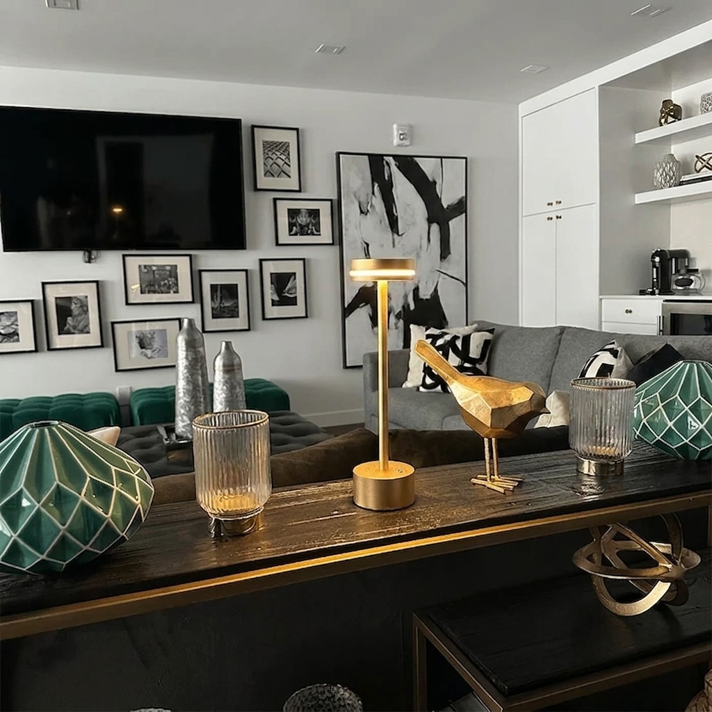 Halden Cordless Table Lamp – lit on a console table below a TV
