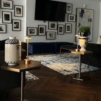 Halden Cordless Table Lamp – lit on side tables beside a navy sofa