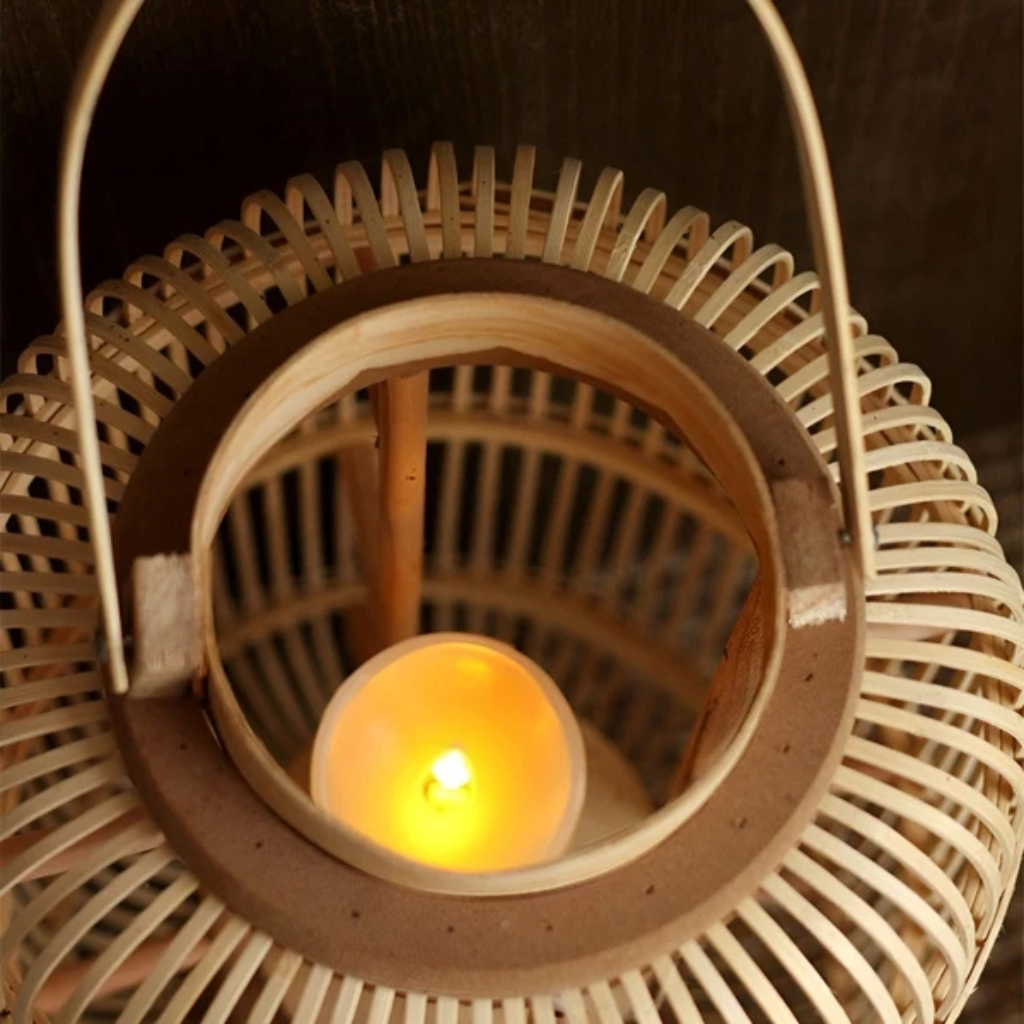 Reed Bamboo Candle Lantern – close-up of the lid and lit candle inside