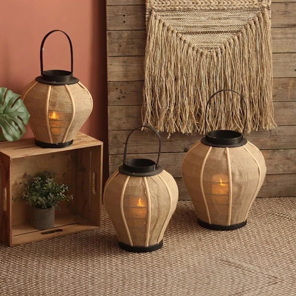 Hollis Wooden Candle Lantern – three lanterns in different sizes against a wall