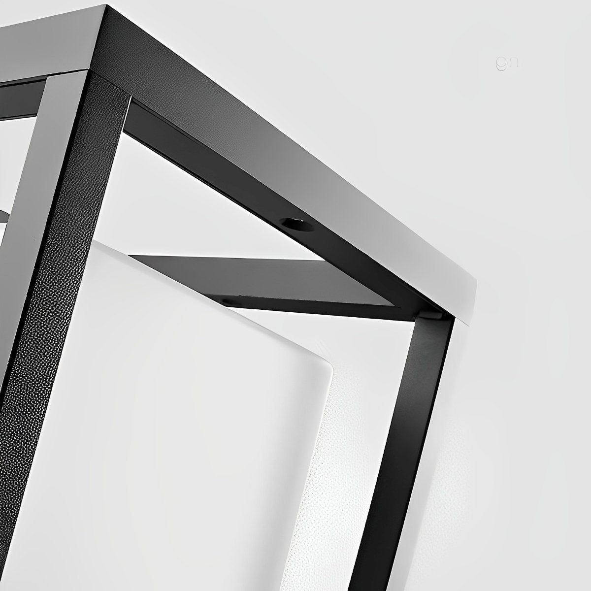 Square Black Solar Fence Post Light – close-up of the frame joint, white background