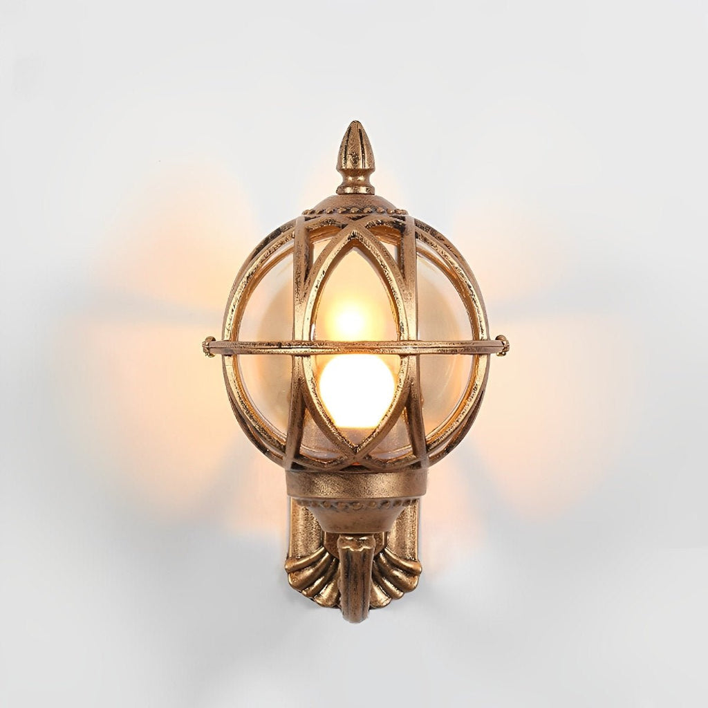 Bird's Nest Outdoor Wall Lantern – white background, antique brass finish, lit